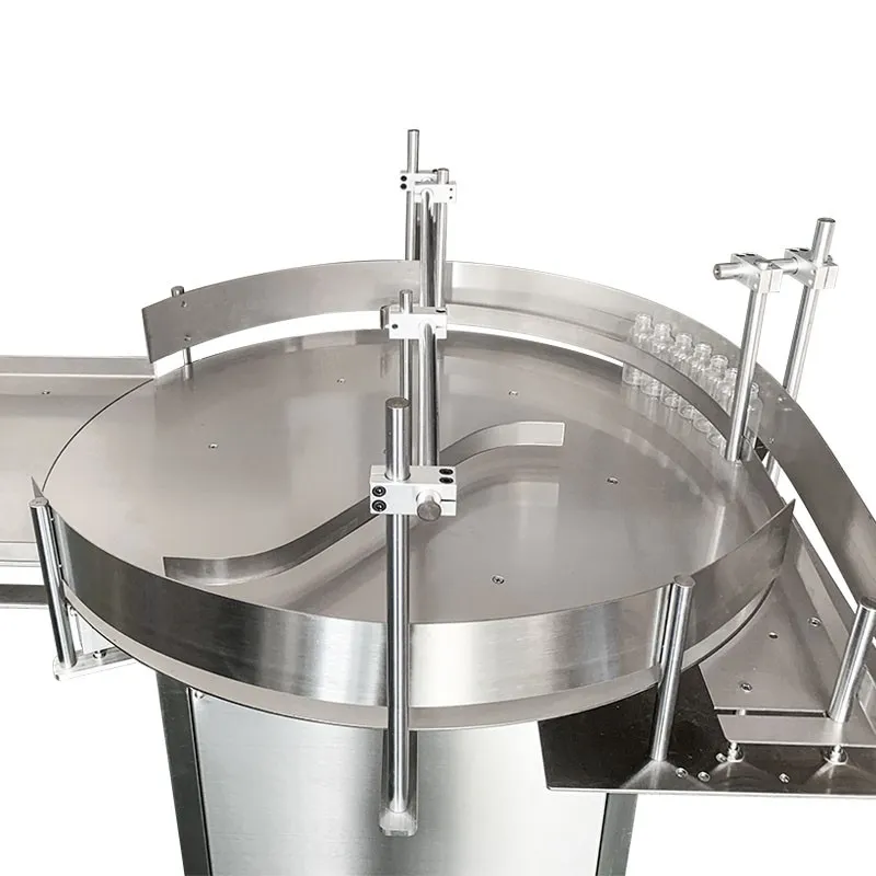 Close view of the rotary bottle table and adjustable guide rails