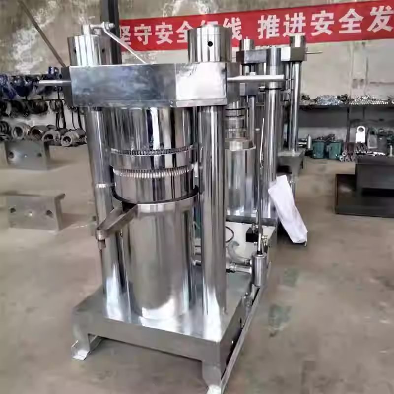 Stainless steel hydraulic cocoa butter press for a cocoa processing line