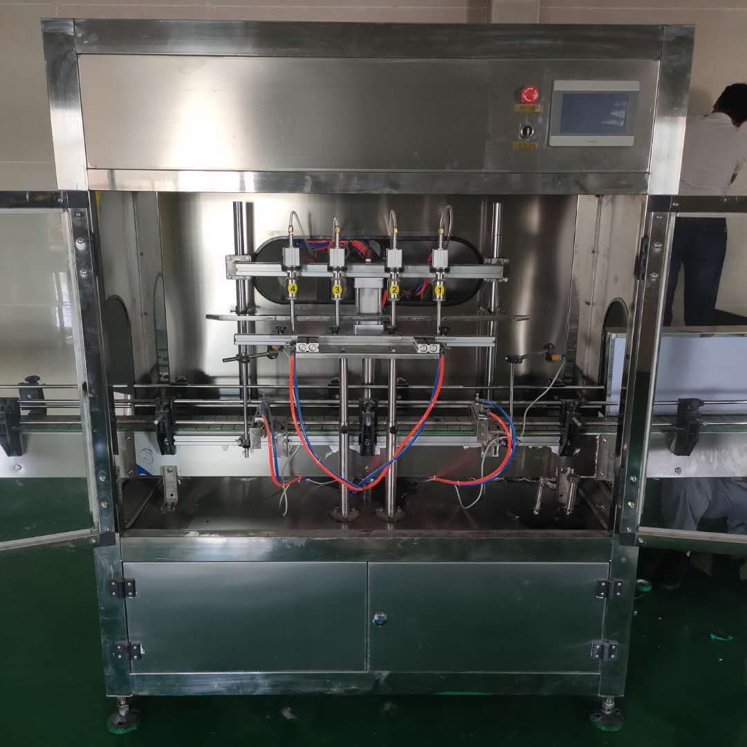 Automatic edible oil flow-meter filling machine with multiple filling heads and conveyor